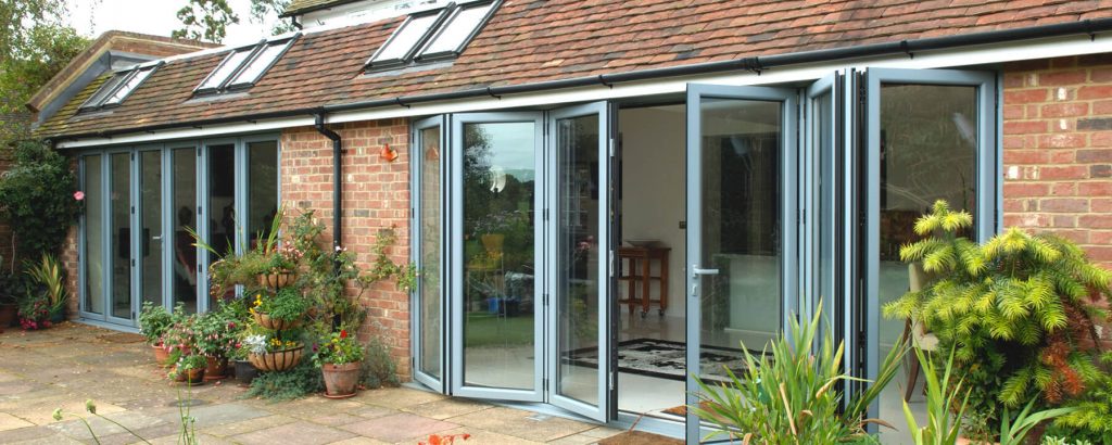 Aluminium bifold doors on a brick home