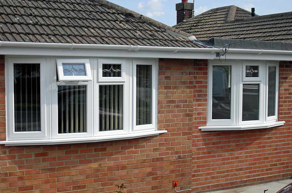 White uPVC bow casement windows